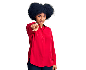 Young african american girl wearing casual clothes pointing displeased and frustrated to the camera, angry and furious with you