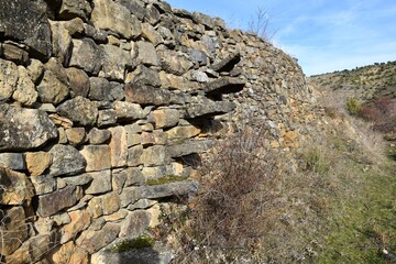Stone stairs in dry stone terrace in rural area. Dry stone walls in the village of Valdevigas, La Rioja, Spain.