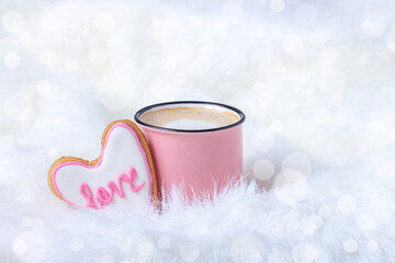 Obraz na płótnie Canvas Mug of Coffee with Heart shaped Cookie in shining bed for Valentine day or Wedding