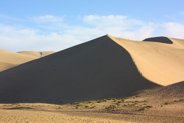 Fototapeta na wymiar View Of Desert Against Cloudy Sky