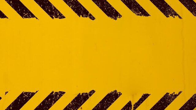 Yellow background with black grunge hazard sign