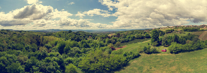 Picturesque aerial panorama of spring countryside on a sunny day.