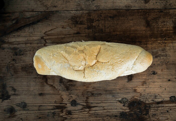 fresh bread on old wood background