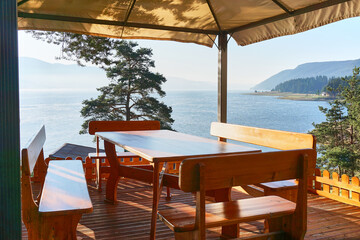 Obraz premium Relaxing pergola with wonderful landscape view