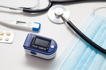 Medical equipment on the doctor's desk. Oximeter