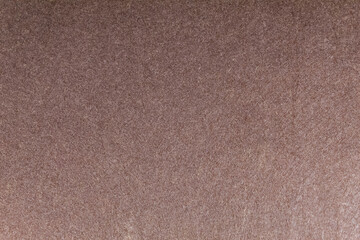 Fototapeta na wymiar Background, texture. Close up of brown felt.