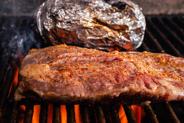 barbecue grilled beef matambre with metallic fire potatoes córdoba argentina