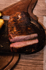 barbecue grilled beef matambre with metallic fire potatoes córdoba argentina