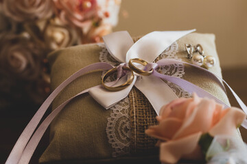 Wedding rings on a pillow