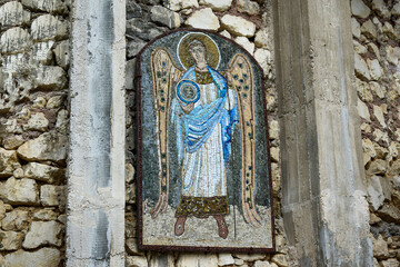 Mosaic of the archangel decorating the wall of the church