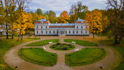 Aerial view of old manor in autumn in Lithuania by drone