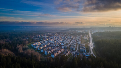 Fototapeta premium Aerial view of Santariskes living district during sunset by drone