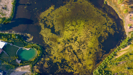 Top down view of handmade pond and old lake in Vilnius by drone