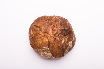 Fototapeta premium Round loaf of freshly backed sourdough bread