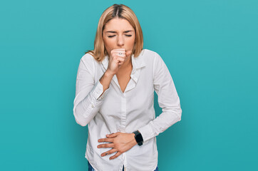 Young caucasian woman wearing casual clothes feeling unwell and coughing as symptom for cold or bronchitis. health care concept.