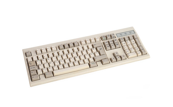 Cut Out Image Of An Old Computer Keyboard, Isolated On White Background