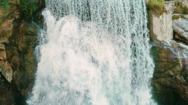 Khedi Waterfall located at River Bhagirathi ,Maneri, Uttarakhand, India .One of the biggest man made waterfall on route from Uttarkashi to Gangotri highway. Camera Tilt Down. Shot on sony FS7 2 in  4K