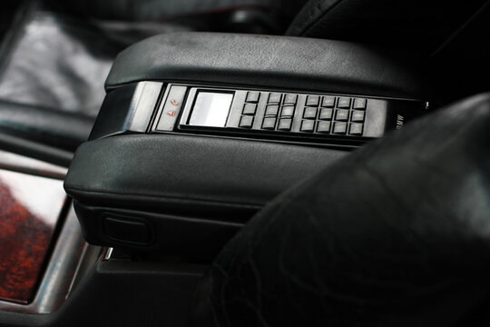Chernigov, Ukraine - January 6, 2021: Car BMW 7 (E38). Phone in a BMW car. Car details. Car interior details