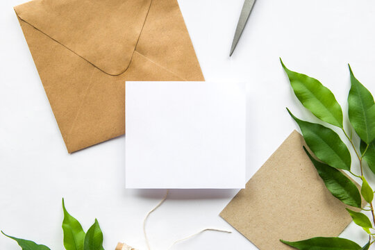 Brown grey develope with white card with space for text. Postcard, greeting or invitation card.