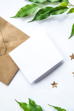 Brown grey develope with white card with space for text. Postcard, greeting or invitation card.