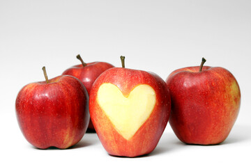 
red apple with heart pattern