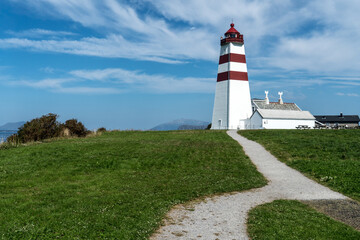 Fototapeta na wymiar Alnes lighthouse on Godøya Island near Ålesund