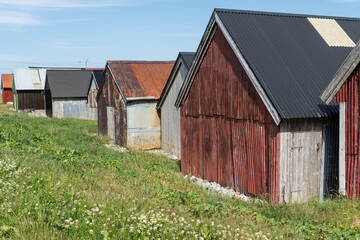 Fototapeta na wymiar Fishing huts in Alnes on the island of Godøya near Ålesund