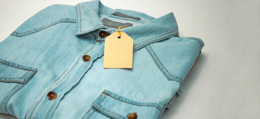 blue shirt and price tag