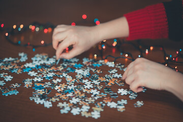 person holding puzzle