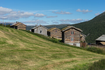 Mountain farm by the Åmotan waterfalls