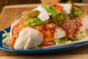 Burritos or tacos. Mexican or Tex-Mex food favorite. Seasoned meat, refried or black beans, Mexican rice, cheese, fried vegetables wrapped in homemade tortillas and served with salsa. Takeout favorite