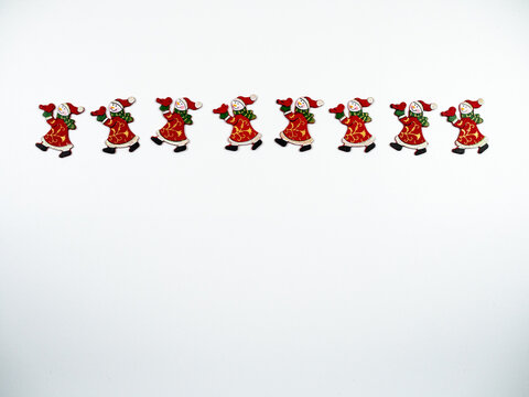 Christmas composition. Snowmen on white background. Flat lay, top view.