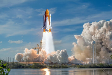 Spaceship takes off into the sky. Rocket starts into space. Concept “Elements furnished by NASA” - Powered by Adobe