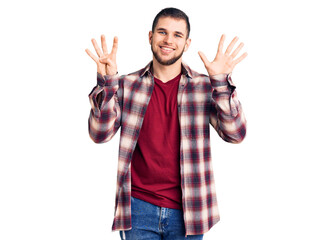 Young handsome man wearing casual shirt showing and pointing up with fingers number nine while smiling confident and happy.