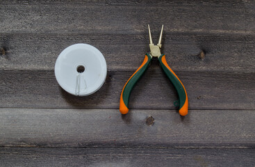 Tools for making jewelry and accessories. Pliers and metal wire
