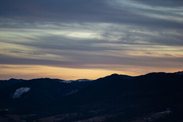 Forest silhouette on the background of sunset in the carpathians