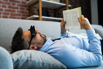 Man Using Lazy Reading Prism Glasses