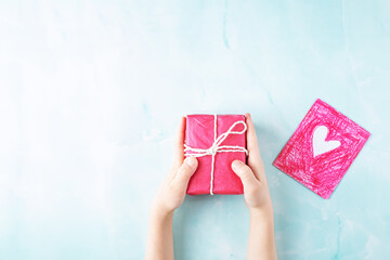 Valentine's background with pink gifts and cards with heart