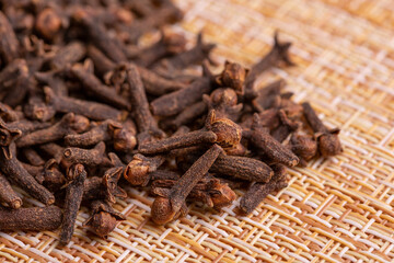 Carnation seeds on a wooden background. Close up of carnation seeds. Carnation seeds.