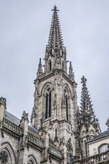 Fototapeta na wymiar Neo-Gothic style Mulhouse Saint Etienne Temple (Protestant St. Stephen's Church, 1859) on the site of XII century church. Mulhouse, Alsace, France.