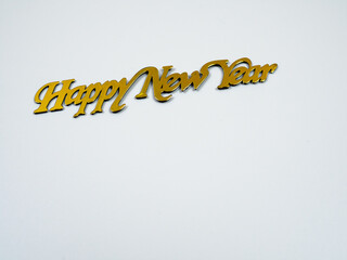 Golden Happy New Year logo on white background. Flat lay, top view.