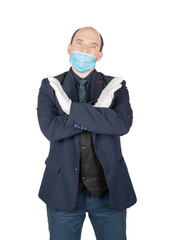 Handsome young business man wearing surgical medical virus protection white mask incorrect wrong way isolated