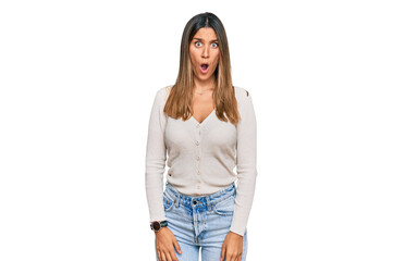 Young woman wearing casual clothes afraid and shocked with surprise expression, fear and excited face.