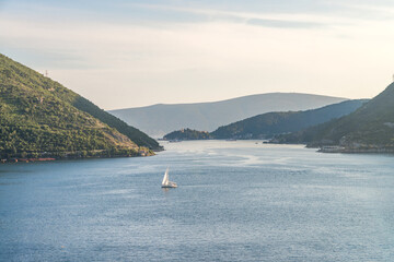 Obraz premium Bay of Kotor with several boats at sunset