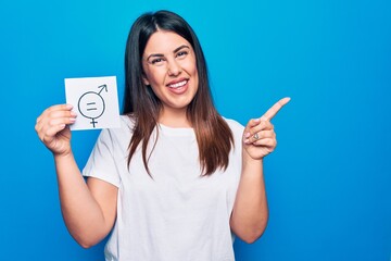 Young beautiful woman asking for sex discrimination holding paper with gender equality concept...