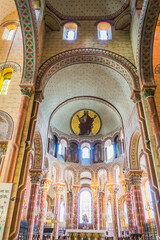 Obraz premium the colorful frescoes covering the walls and ceiling of the choir of the romanesque Saint Austremoine abbey church in Issoire, Auvergne (France) 