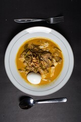 Lontong sayur padang is identical with coconut milk sauce that has a thick seasoning typical of minang cuisine. Coconut milk sauce rich in spices is known as one of the ways to cook minang cuisine