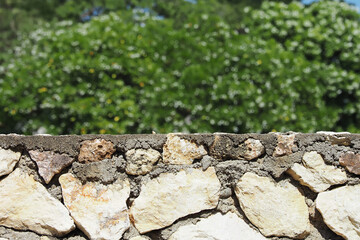 old fashioned rock wall with large rocks close up of rock wall close up of detailed rough surface , which ideal for use in the design