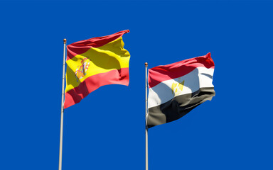 Flags of Spain and Egypt.