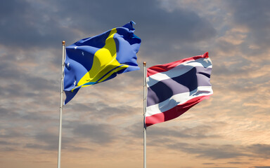 Flags of Tokelau and Thailand.